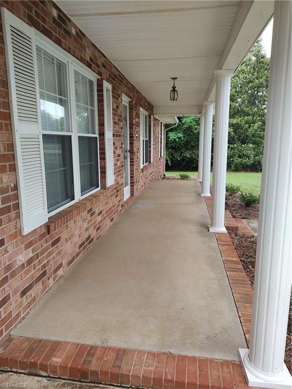 3785 Ellisboro Rd, Stokesdale, NC 27357 - view of patio / terrace with a porch