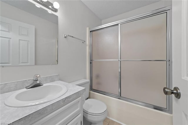 3785 Ellisboro Rd, Stokesdale, NC 27357 - bathroom featuring vanity, toilet, enclosed tub / shower combo, and tile patterned floors