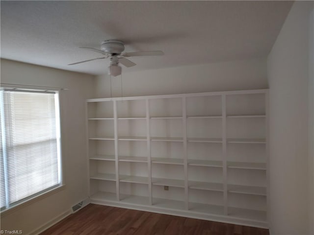 3785 Ellisboro Rd, Stokesdale, NC 27357 - spare room with dark wood-type flooring, ceiling fan, plenty of natural light, and baseboards