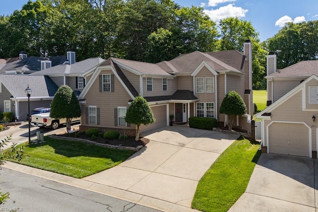 121 Walter Hagen Dr, Mebane, NC 27302 - traditional-style house with concrete driveway, a front yard, and an attached garage