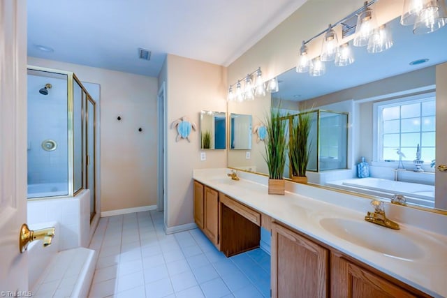 121 Walter Hagen Dr, Mebane, NC 27302 - full bathroom with a bath, a stall shower, double vanity, tile patterned flooring, and baseboards