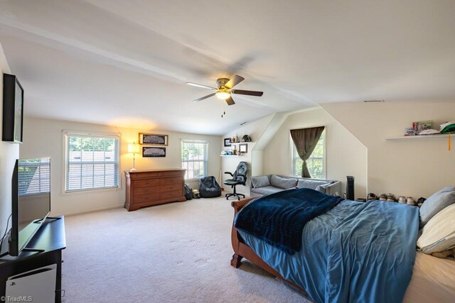 121 Walter Hagen Dr, Mebane, NC 27302 - bedroom featuring carpet flooring, multiple windows, lofted ceiling, and a ceiling fan