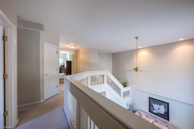 121 Walter Hagen Dr, Mebane, NC 27302 - hallway featuring light carpet, an upstairs landing, baseboards, and recessed lighting