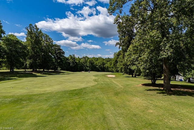 121 Walter Hagen Dr, Mebane, NC 27302 - view of property's community featuring view of golf course, a yard, and view of scattered trees