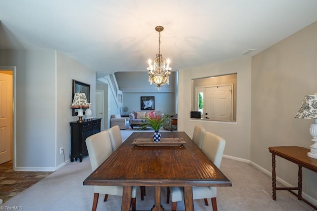 121 Walter Hagen Dr, Mebane, NC 27302 - dining space with a chandelier, light colored carpet, and baseboards