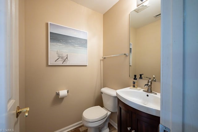 121 Walter Hagen Dr, Mebane, NC 27302 - bathroom with toilet, vanity, and baseboards