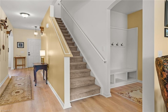 1720 Ridge Bluff Cir, Rural Hall, NC 27045 - stairway with wood finished floors and arched walkways