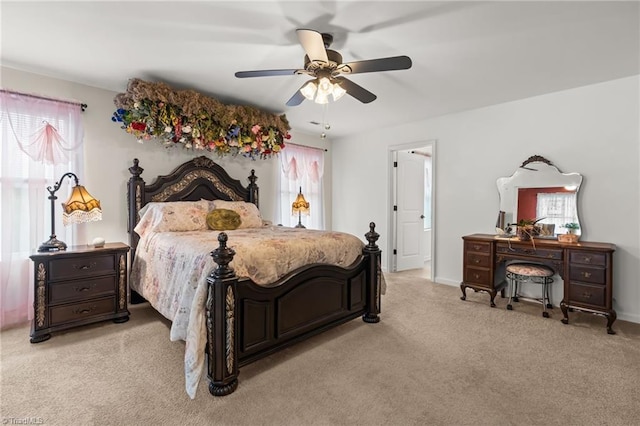 1720 Ridge Bluff Cir, Rural Hall, NC 27045 - bedroom featuring multiple windows, light colored carpet, and a ceiling fan