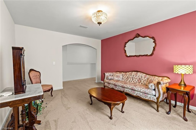 1720 Ridge Bluff Cir, Rural Hall, NC 27045 - carpeted living room with arched walkways and baseboards
