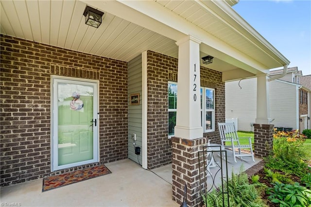 1720 Ridge Bluff Cir, Rural Hall, NC 27045 - entrance to property featuring covered porch and brick siding