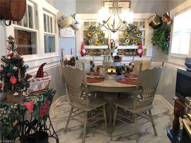 dining room with a chandelier