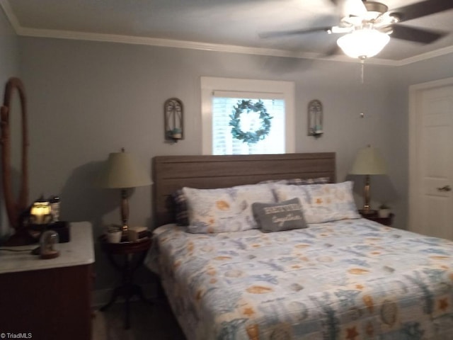 bedroom featuring ceiling fan and crown molding