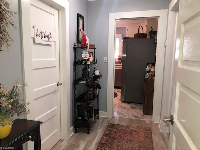 hall featuring light hardwood / wood-style flooring