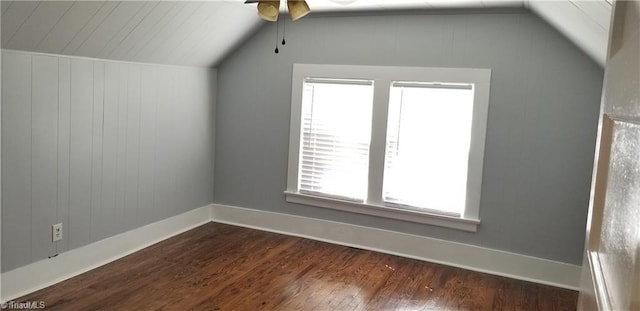 bonus room with ceiling fan, dark hardwood / wood-style flooring, and lofted ceiling