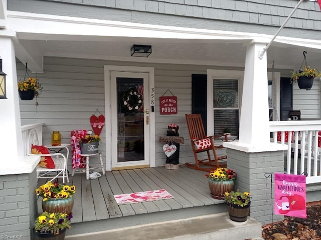 property entrance with a porch