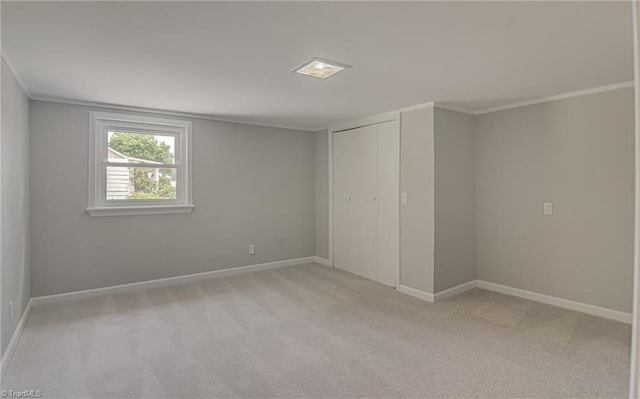 4249 High Point Rd, Winston-Salem, NC 27107 - unfurnished bedroom with light carpet, a closet, and ornamental molding