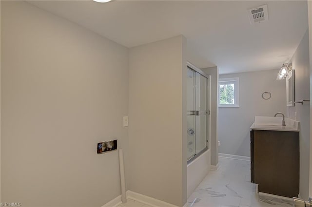 4249 High Point Rd, Winston-Salem, NC 27107 - bathroom with vanity, marble finish flooring, and enclosed tub / shower combo