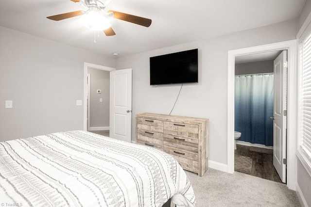 815 Martin Luther King Jr Ave, Salisbury, NC 28144 - bedroom with light carpet, baseboards, a ceiling fan, and ensuite bathroom