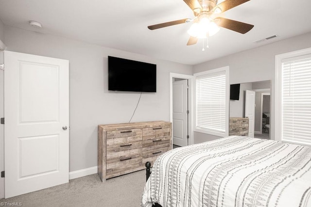 815 Martin Luther King Jr Ave, Salisbury, NC 28144 - bedroom with light carpet, baseboards, and ceiling fan