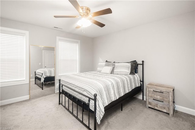 815 Martin Luther King Jr Ave, Salisbury, NC 28144 - carpeted bedroom featuring baseboards and a ceiling fan