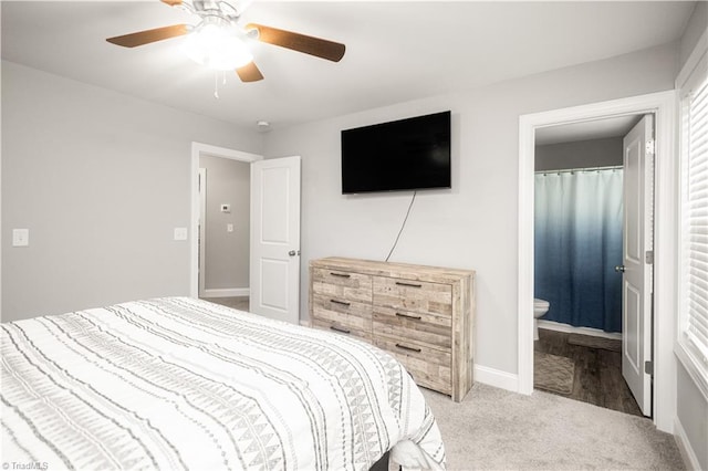 815 Martin Luther King Jr Ave, Salisbury, NC 28144 - bedroom with light carpet, a ceiling fan, ensuite bath, and baseboards