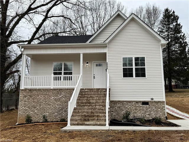 bungalow featuring covered porch