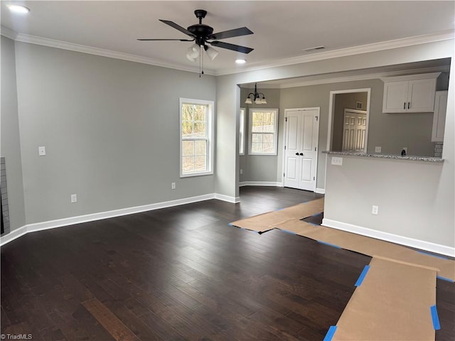 unfurnished living room with crown molding, ceiling fan, and dark hardwood / wood-style flooring