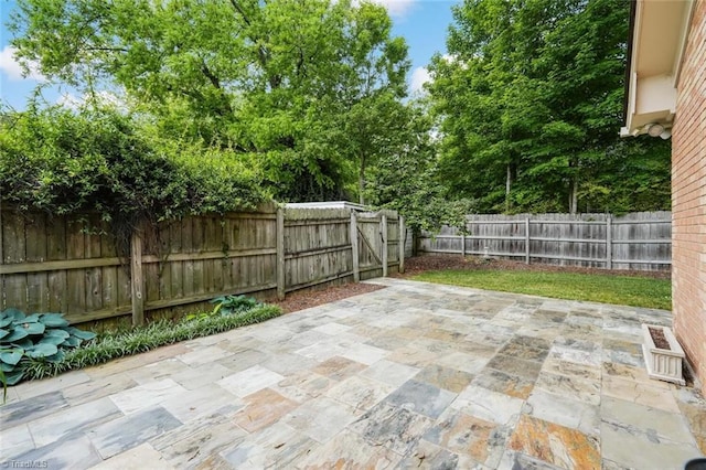 view of patio with a fenced backyard