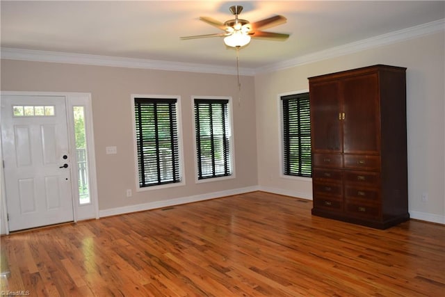 5170 Tabernacle School Rd, Asheboro, NC 27205 - entryway featuring wood finished floors, a ceiling fan, and ornamental molding