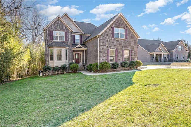 view of front facade with a front lawn