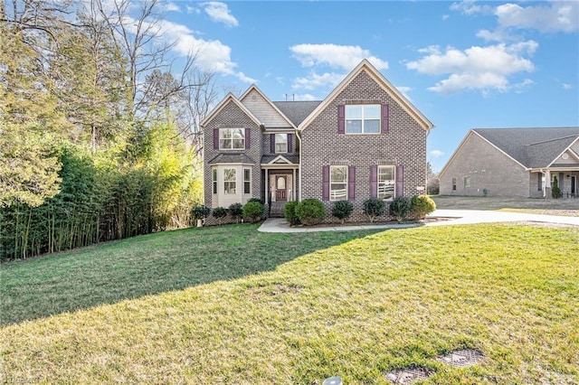 view of front of home featuring a front yard