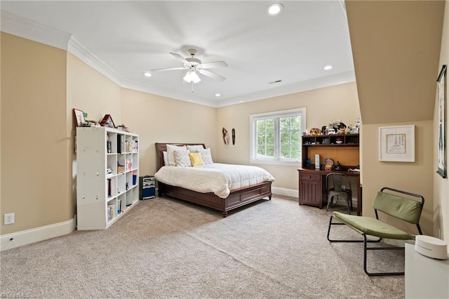 bedroom with carpet, ceiling fan, and crown molding