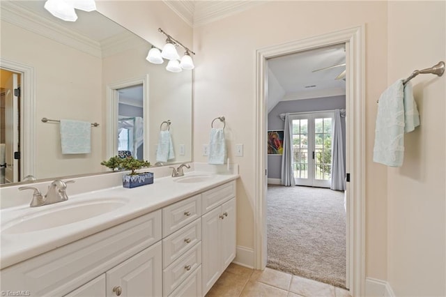 bathroom featuring tile patterned floors, double sink vanity, french doors, and crown molding