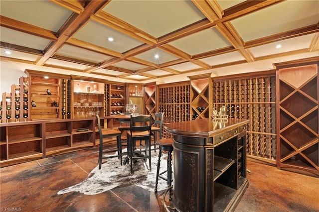 wine area featuring beam ceiling, tile patterned floors, and coffered ceiling