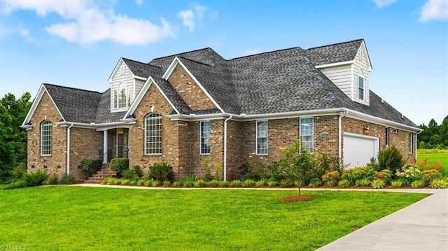 7103 Ludgate Rd, Gibsonville, NC 27249 - traditional-style home featuring brick siding, a front lawn, and a shingled roof