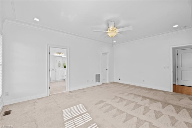 7103 Ludgate Rd, Gibsonville, NC 27249 - spare room with light colored carpet, ornamental molding, ceiling fan, and recessed lighting