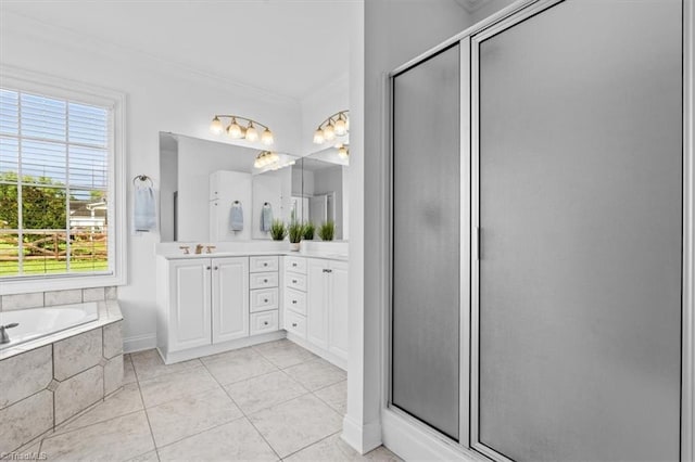 7103 Ludgate Rd, Gibsonville, NC 27249 - bathroom with double vanity, ornamental molding, healthy amount of natural light, a stall shower, and a bath