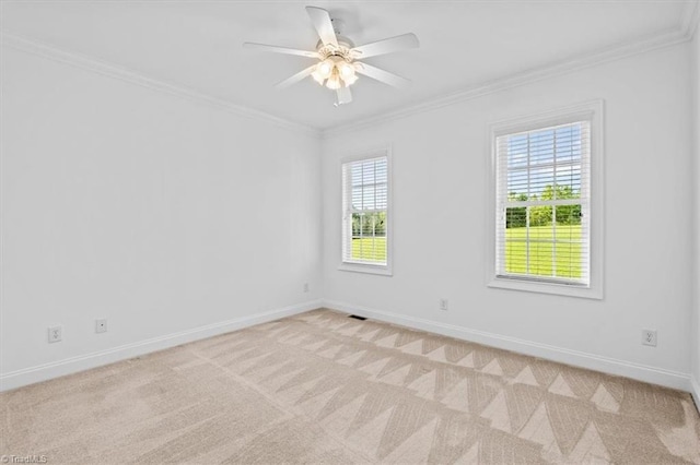7103 Ludgate Rd, Gibsonville, NC 27249 - spare room with crown molding, light carpet, and a ceiling fan