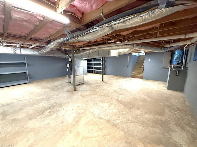 856 Haynes Rd, Elkin, NC 28621 - unfinished below grade area featuring stairs and heating unit