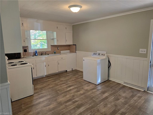 kitchen with washer / dryer, ornamental molding, white cabinetry, dark wood-type flooring, and white electric range oven