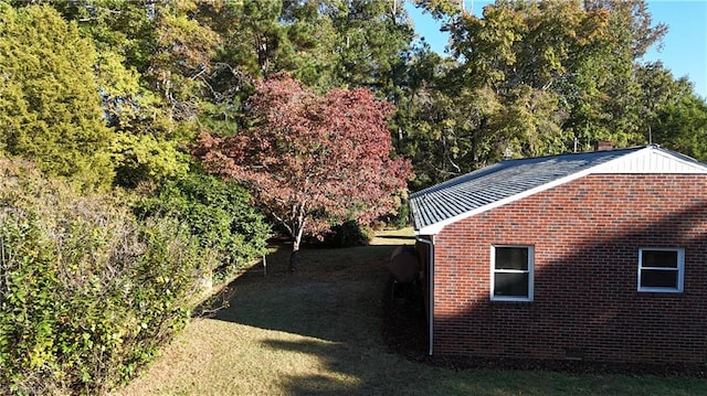 view of property exterior featuring a yard