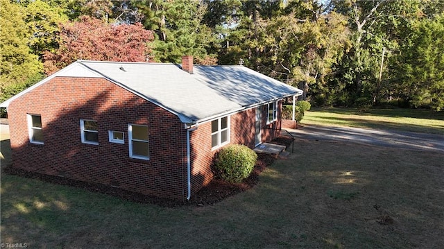 exterior space with a lawn