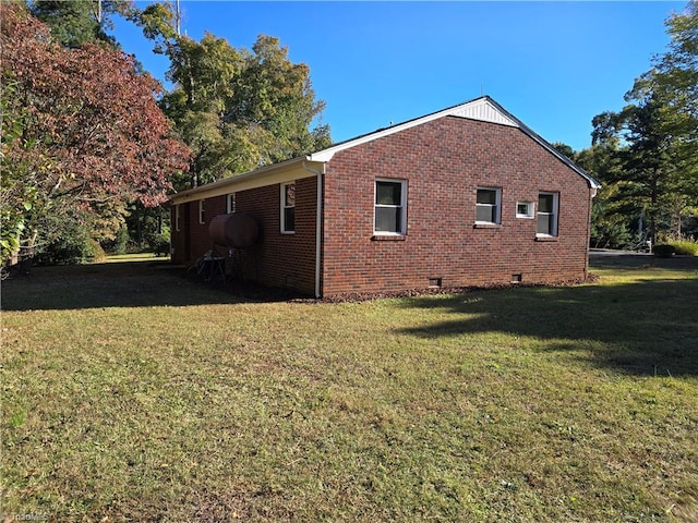 view of property exterior featuring a lawn