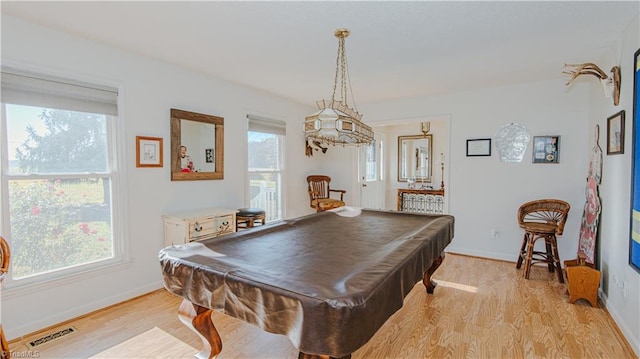 game room with light hardwood / wood-style floors and billiards