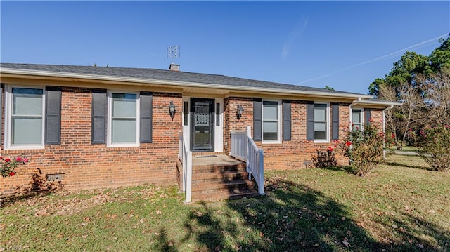 view of front facade with a front yard