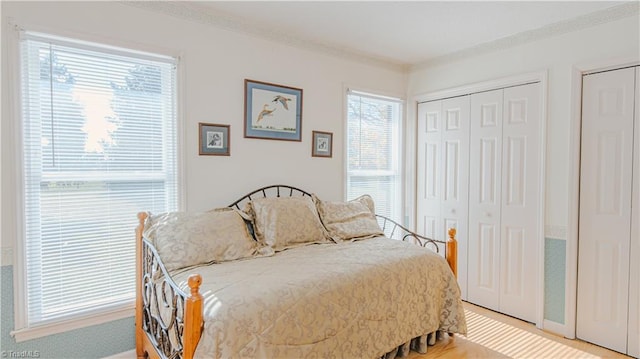 bedroom with ornamental molding