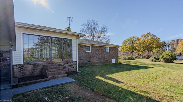 view of home's exterior featuring a lawn