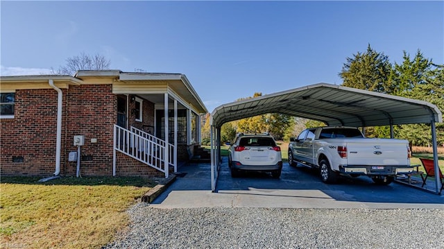 view of car parking featuring a carport and a yard