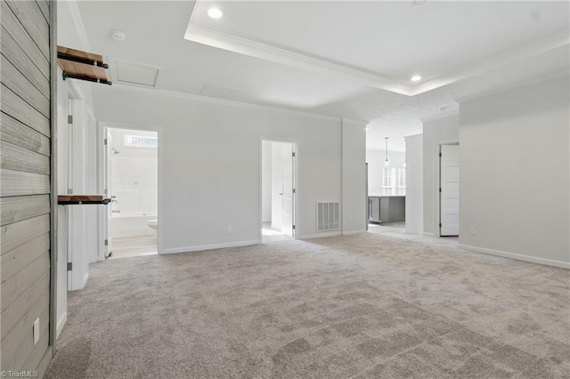2875 Motsinger Rd, Winston-Salem, NC 27107 - empty room featuring a raised ceiling, crown molding, light carpet, recessed lighting, and attic access