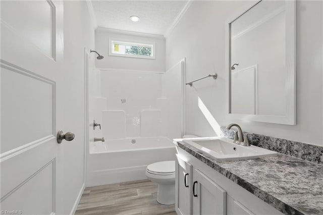 2875 Motsinger Rd, Winston-Salem, NC 27107 - bathroom with vanity, ornamental molding, wood finished floors, and  shower combination